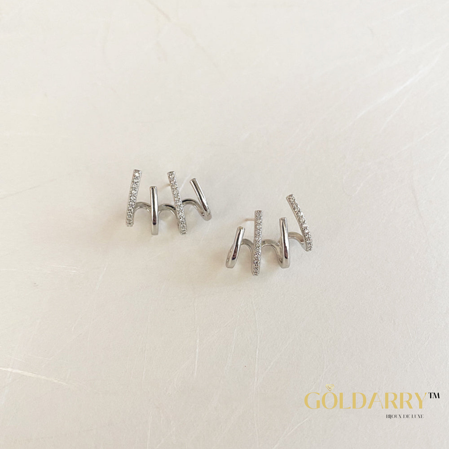 Griffe Earrings