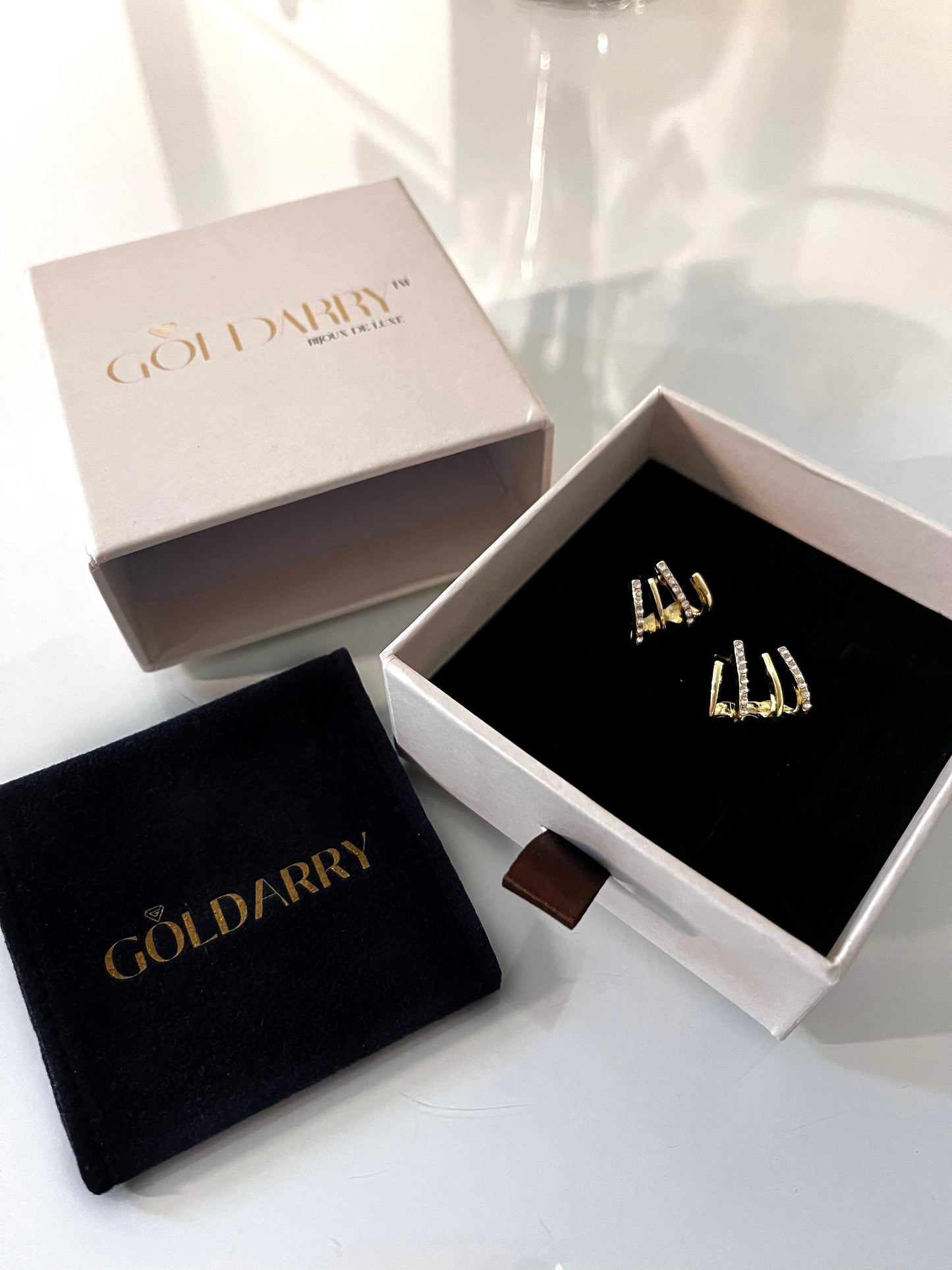 Griffe Earrings