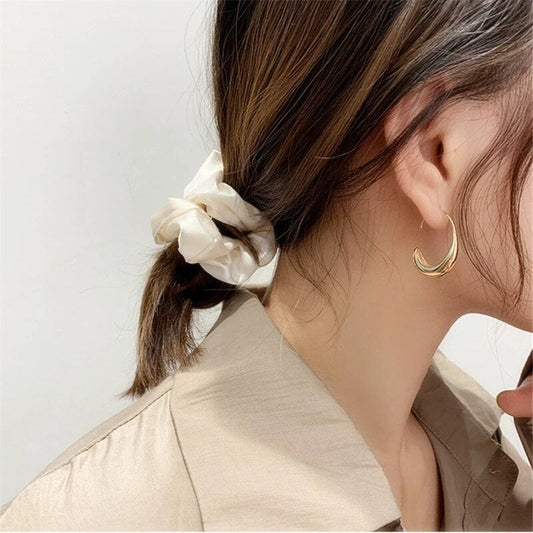 INFINITY CURVE GOLD HOOPS