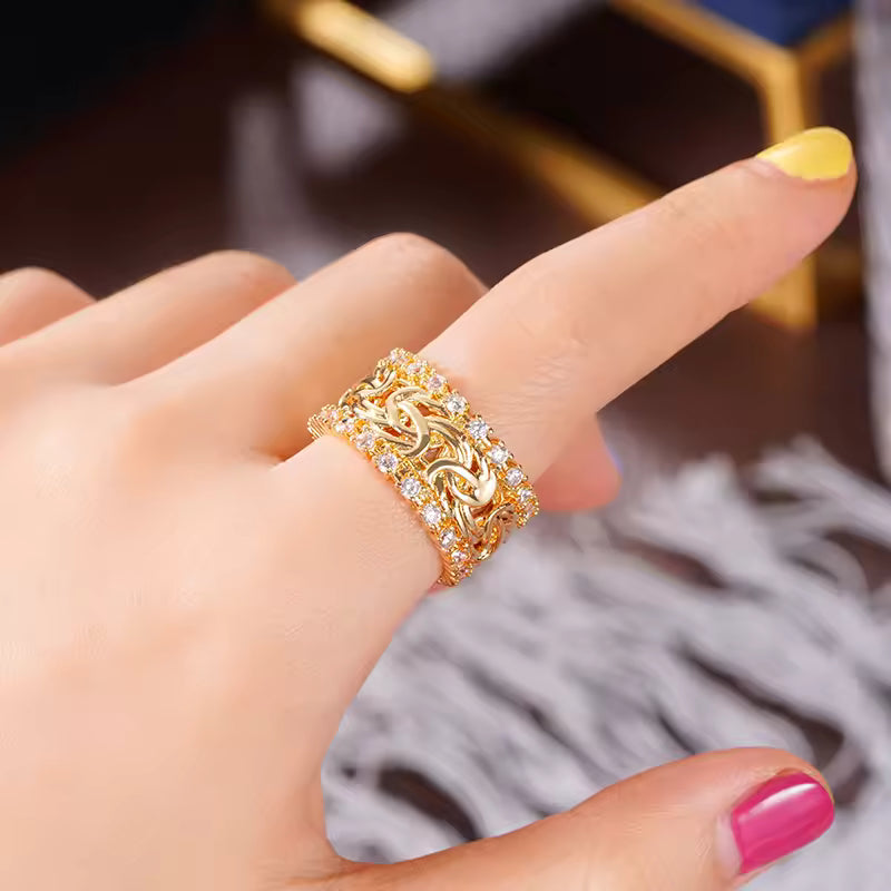BRAIDED GOLDEN ZIRCONIA RING