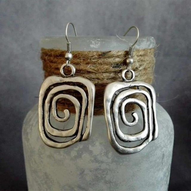 COSMIC TWIST SILVER EARRINGS